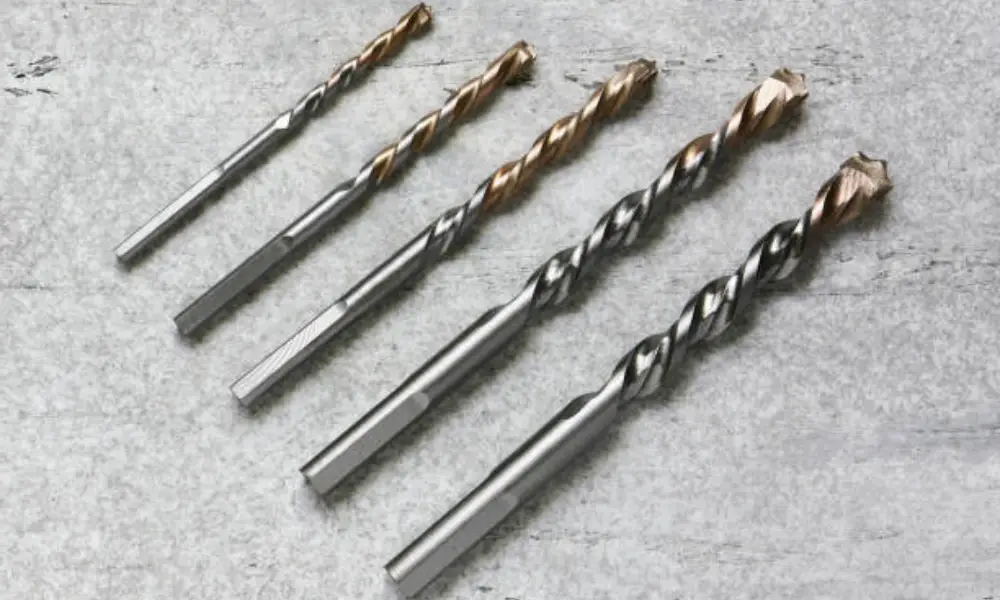 Drill bits for concrete materials